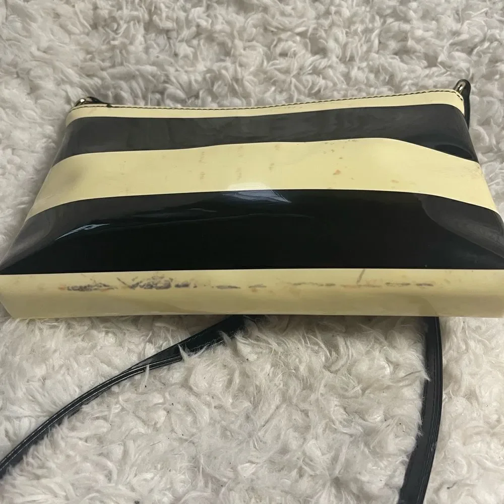 Kate Spade patent Black and Cream Striped small Crossbody Bag.